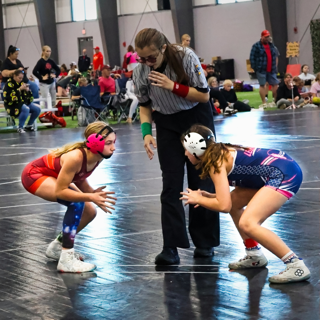 Two girls in the neutral stance at War of the Roses