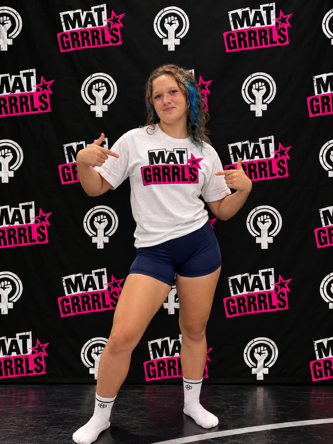 MAT GRRRLS ambassador in the white logo tee